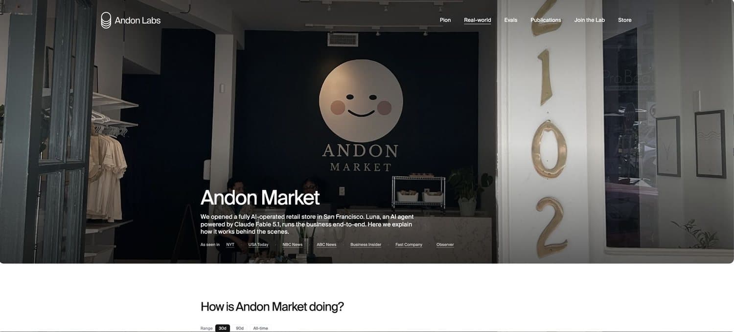Screenshot of Andon Labs' Andon Market page: the shop interior with a smiling-moon "Andon Market" logo on the wall and the street number 2102 on the doorframe, under the headline "Andon Market" and the caption that Luna, an AI agent, runs the store in San Francisco end to end.